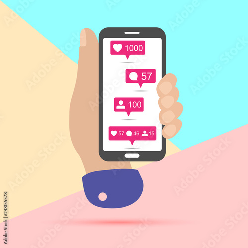 hand holding mobile phone with Share, like, comment, repost social media ui icons on screen with shadow on pastel colored blue and pink background. Pink bubble  icon set for websites