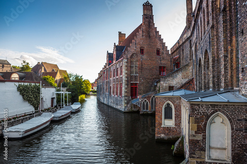 Beautiful canal and traditional houses in the old town of Bruges (Brugge), Belgium