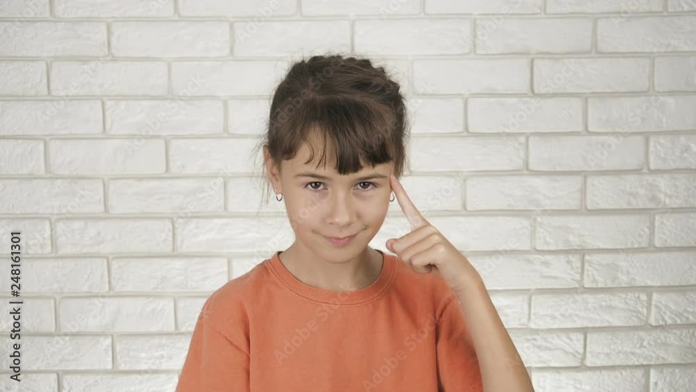 Think, then do it. The little girl points to her head. Think, then do it. The little girl points to her head.