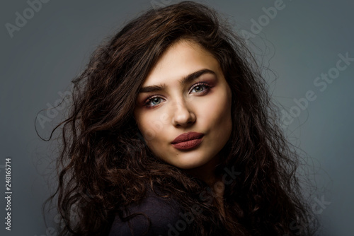 A girl with oriental appearance. portrait of a beautiful girl. young brunette. Glam portrait