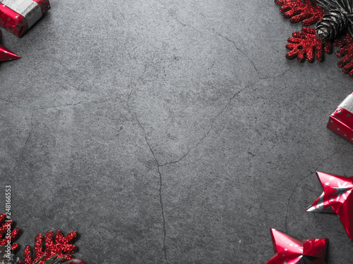 christmas background with decorations and gift boxes on wooden board