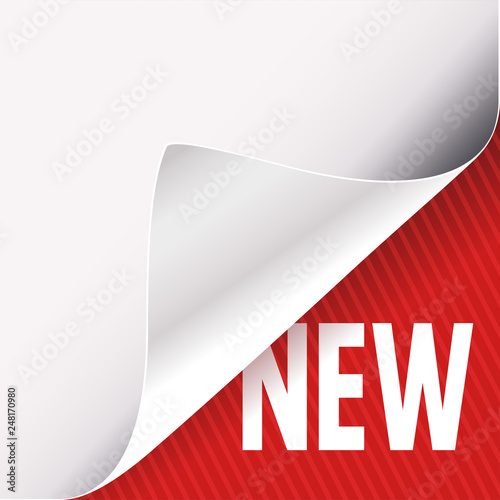 Curled white paper corner on red and New sign