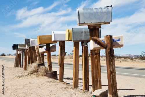 Row Of Mailboxes Along Desert Road photo