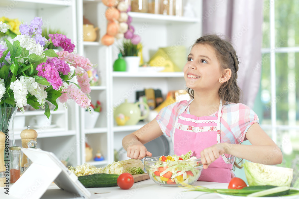 Portrait of cute girl preparing delicious fresh salad Portrait of cute girl preparing delicious fresh salad
