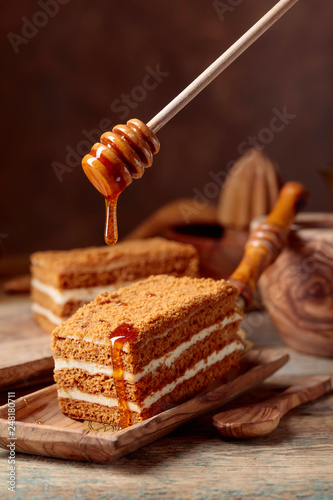 Homemade layered honey cake with cream.