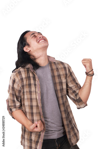 Young Man Shows Winning Gesture