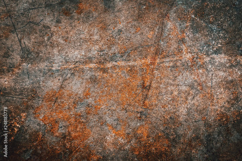Closeup of brown metal rust grunge background texture. Rusted, old, vintage, retro background texture on brown metal or iron plate surface. Industrial obsolete concept image with Copyspace