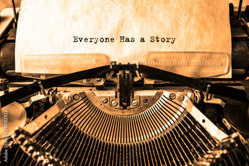 Everyone Has a Story printed on a piece of paper on a vintage typewriter. writer, journalist.