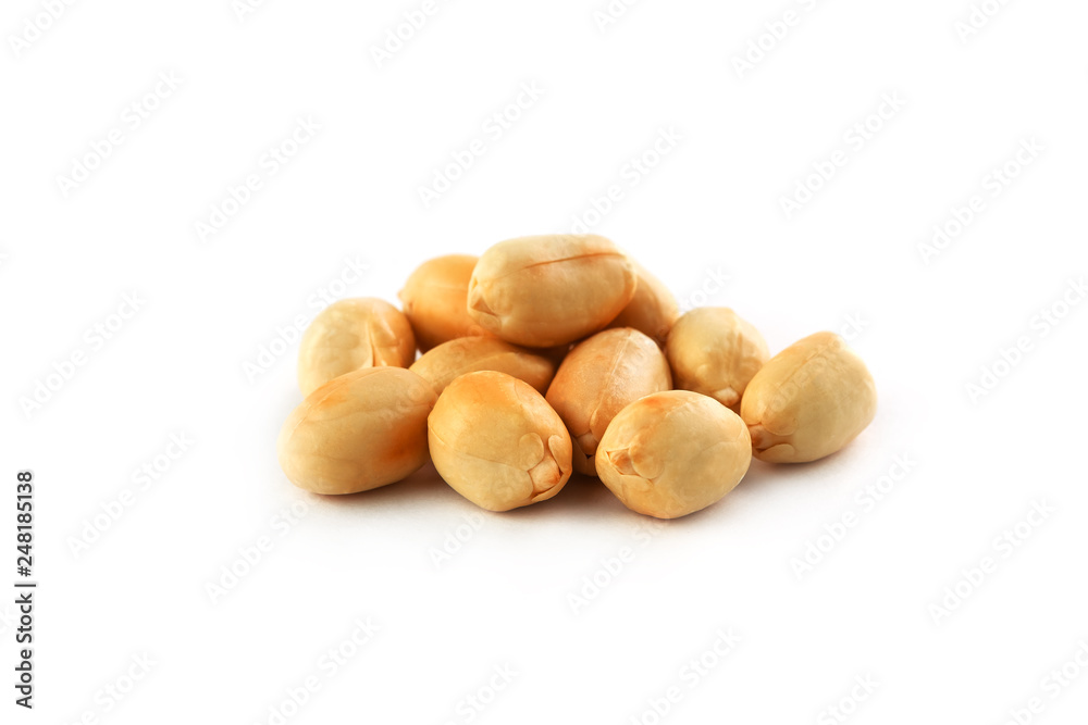 Roasted peanuts peeled and isolated on a white background Roasted peanuts peeled and isolated on a white background