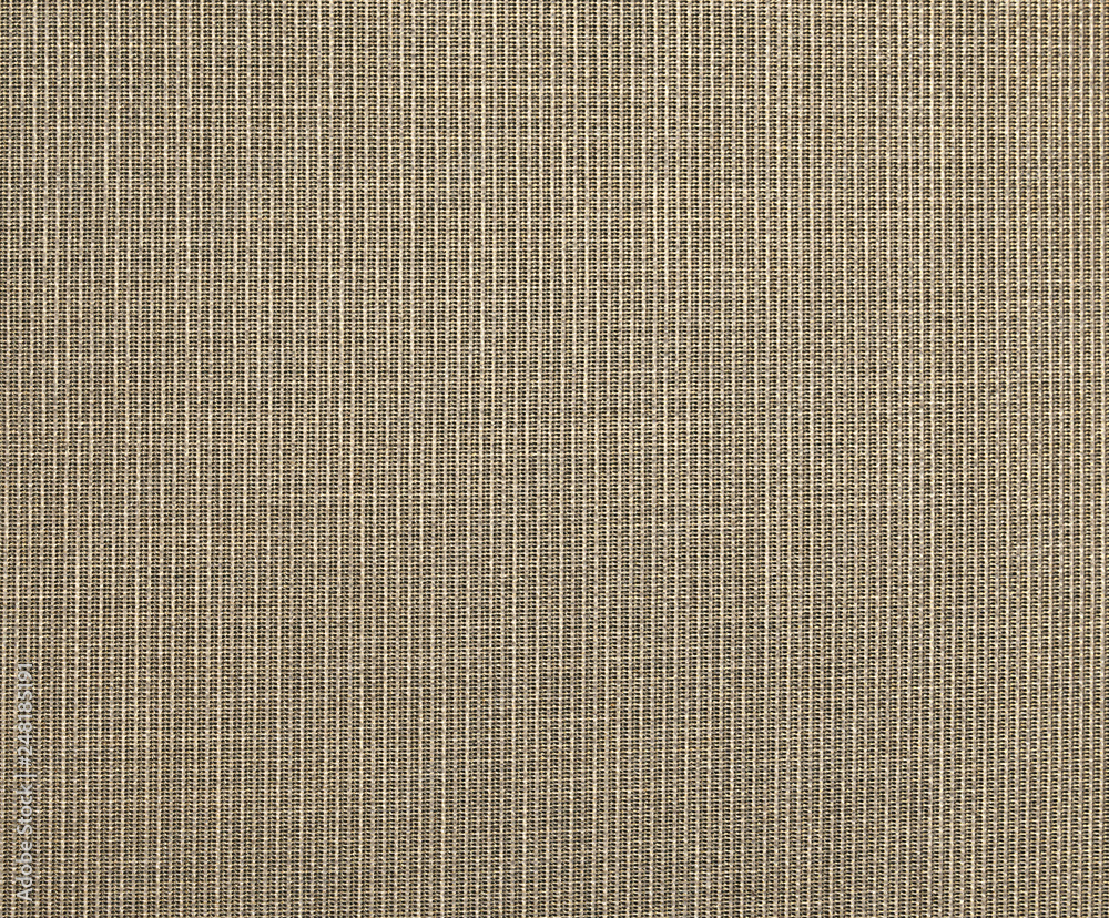 Fototapeta premium The textured beige natural fabric . 