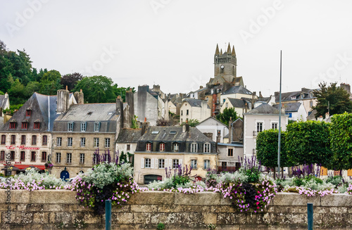 Notre-Dame de l'Assumption above Quai Brizeux at Quimperle. Finistere, Brittany, France photo