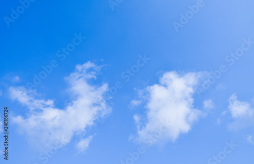 Blue sky background and white clouds with copy space  good for message and background.