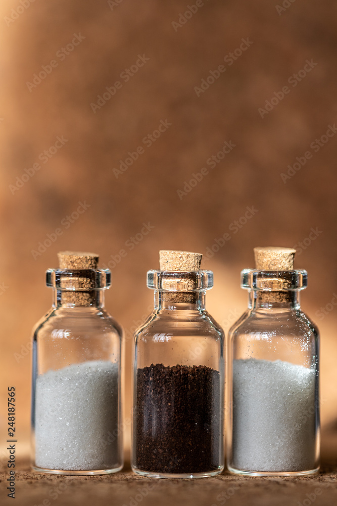 breakfast ingredients in small glass jars - coffee and sugar breakfast ingredients in small glass jars - coffee and sugar
