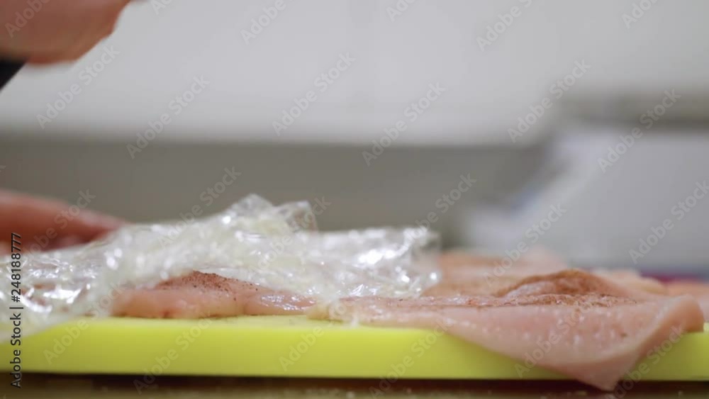 chicken breast hammering peppering getting ready chicken breast hammering peppering getting ready