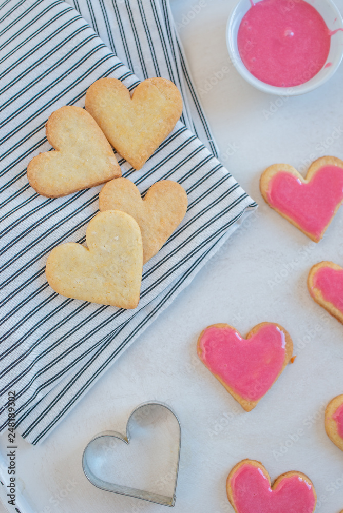 Heart shaped cookies with pink icing Heart shaped cookies with pink icing