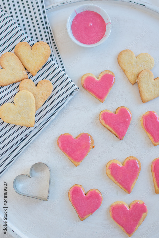 Heart shaped cookies with pink icing Heart shaped cookies with pink icing