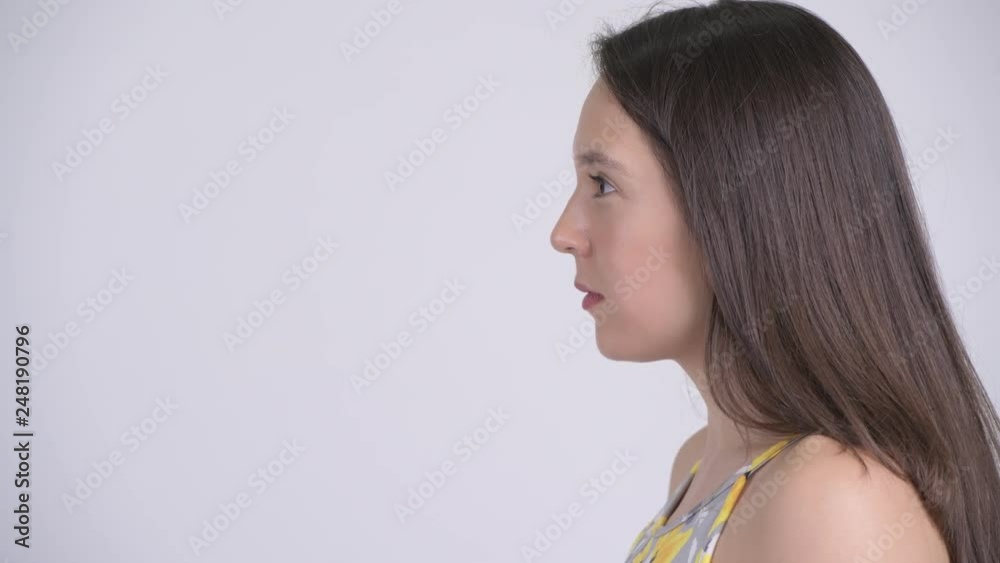 Profile view of young beautiful multi-ethnic tourist woman Profile view of young beautiful multi-ethnic tourist woman