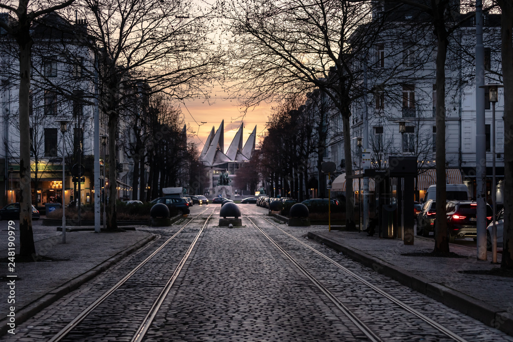 empty street with cobblestones at sunset