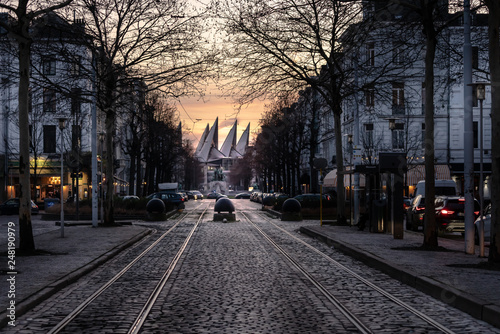 empty street with cobblestones at sunset