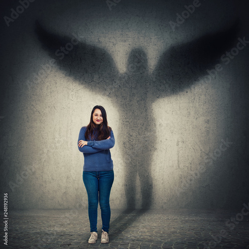 woman casting angel shadow photo