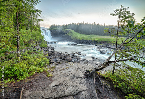 Natural Tannforsen waterfall at evening
