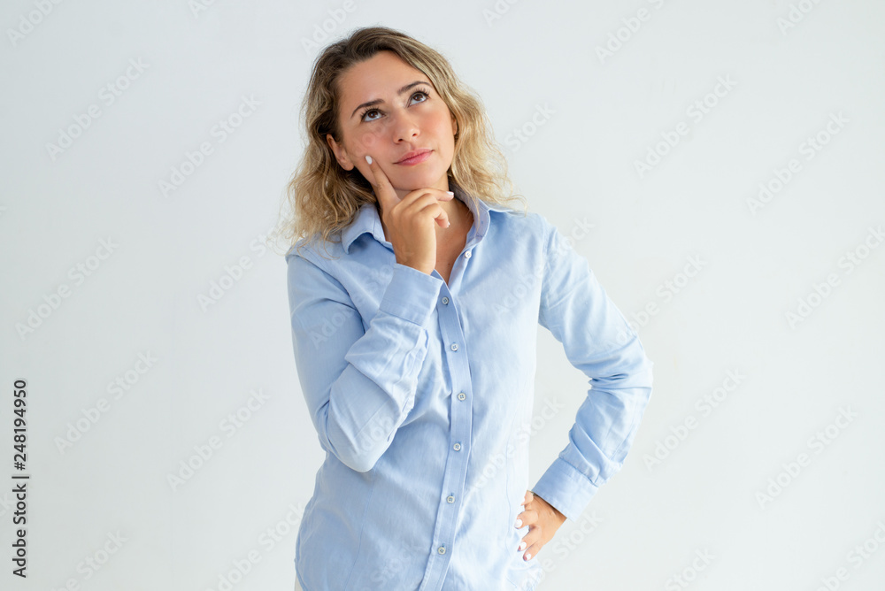 Pensive office girl thinking over her idea Pensive office girl thinking over her idea