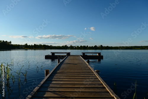 wooden jetty on the lake at early morning