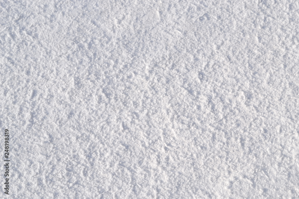 Obraz premium Dense snow surface. Texture, background. Dense snow with indistinct traces.