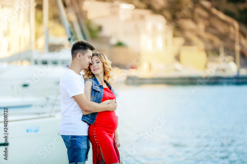 A Pregnant woman with husband on a journey. Boat pearce