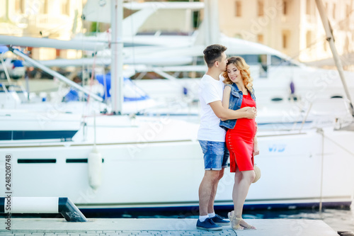 A Pregnant woman with husband on a journey. Boat pearce