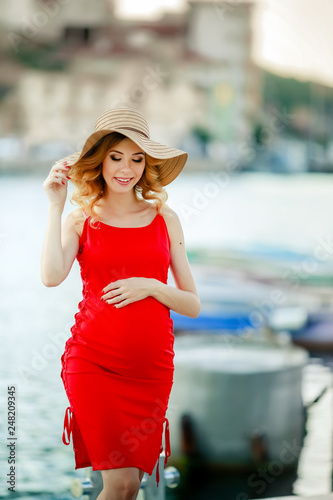 A Pregnant woman with husband on a journey. Boat pearce