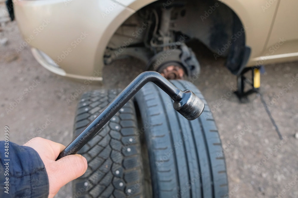 Fototapeta premium seasonal change of wheels on the car