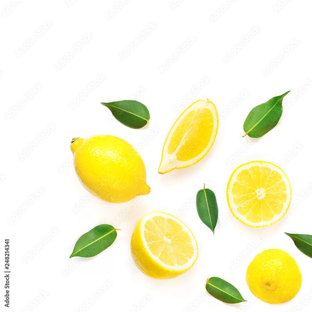 Lemon and slices with leaf isolated on white background. Tropical abstract creative Summer background.  Flat lay, top view.