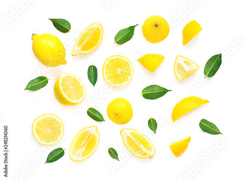 Fototapeta Naklejka Na Ścianę i Meble -  Lemon Summer Pattern. Fresh Lemon fruits and slices with leaf isolated on white background. Flat lay, top view.