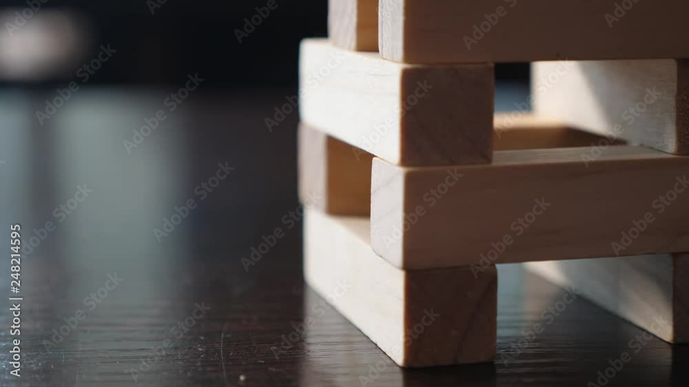 Close up. playing a game of jenga Close up. playing a game of jenga
