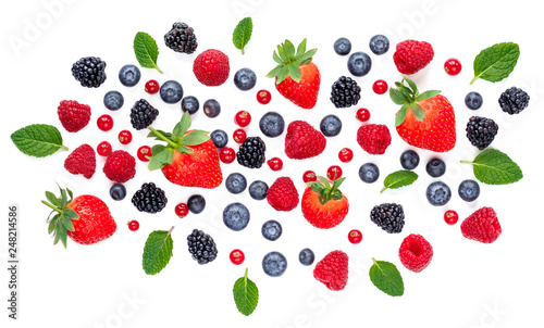 Fresh berries isolated on white background, top view. Strawberry, Raspberry, Cranberry, Blackberry, Blueberry and Mint leaf, flat lay
