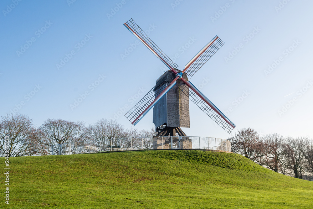 Obraz premium Windmill on a sunny day, Brugge, West Flanders, Belgium