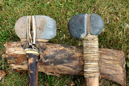 primitive ax and hammer.