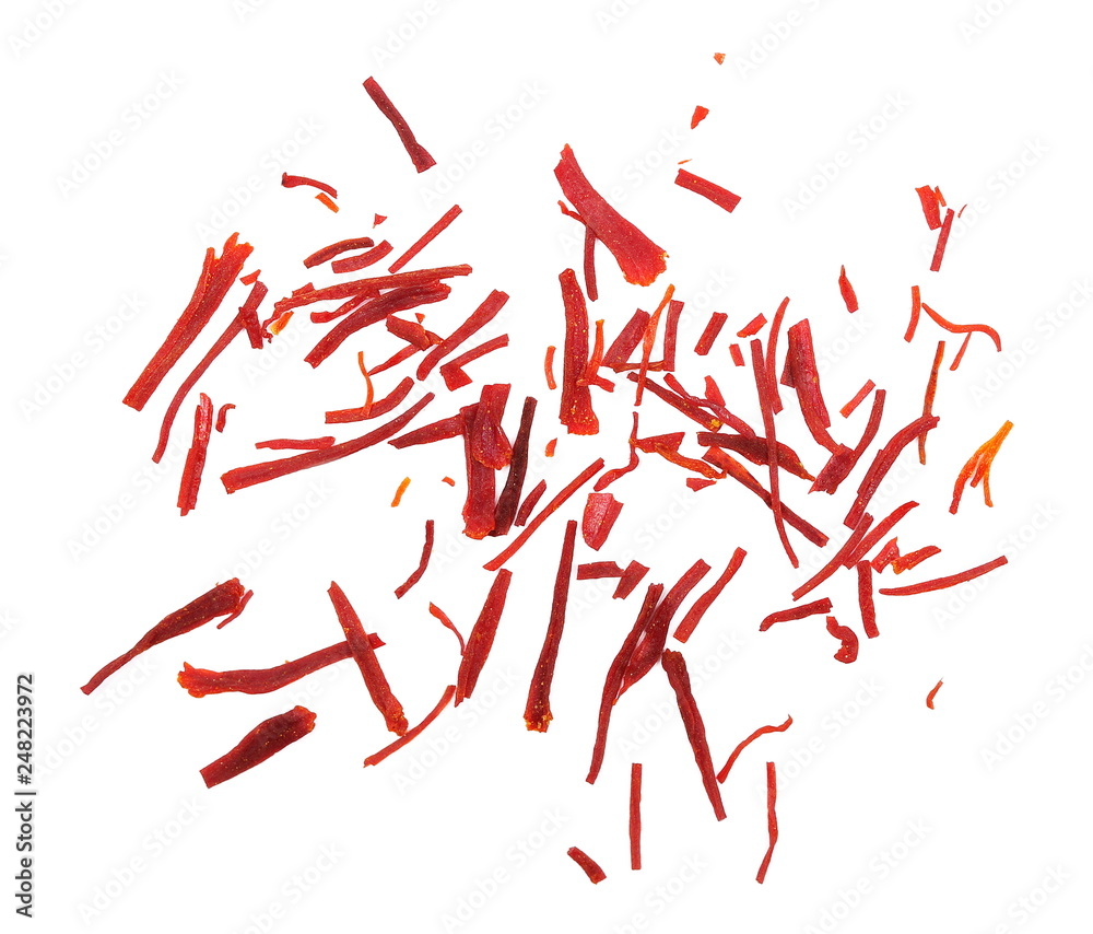 Macro dried saffron threads spice isolated on white background, top view Macro dried saffron threads spice isolated on white background, top view