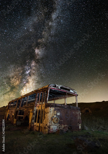 Old bus and milky way galaxy