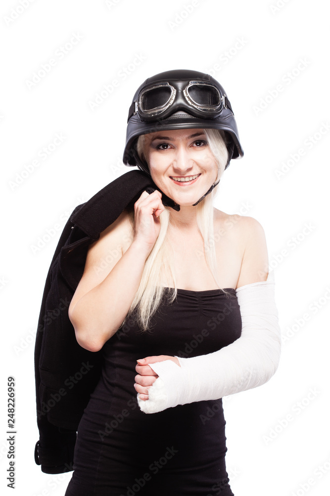 girl with a broken arm in plaster, wearing motorcycle helmet girl with a broken arm in plaster, wearing motorcycle helmet