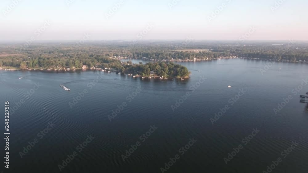 Aerial recreational boaters sailing on a fresh water sport and fishing lake Aerial recreational boaters sailing on a fresh water sport and fishing lake
