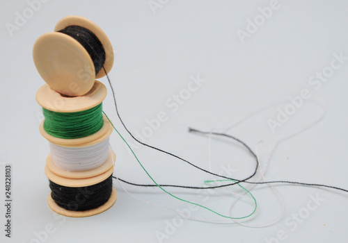 old spools with thread for sewing machine.