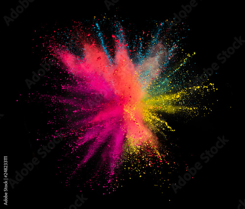 Multi colored powder explosion isolated on black © Jag_cz
