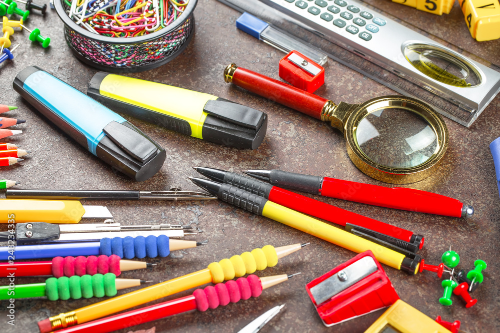 Naklejka premium Back to school. Items for school classes in the composition on the table.