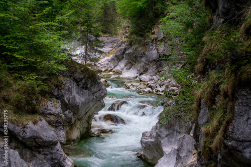 Beautiful mountain stream cascading through a gorge