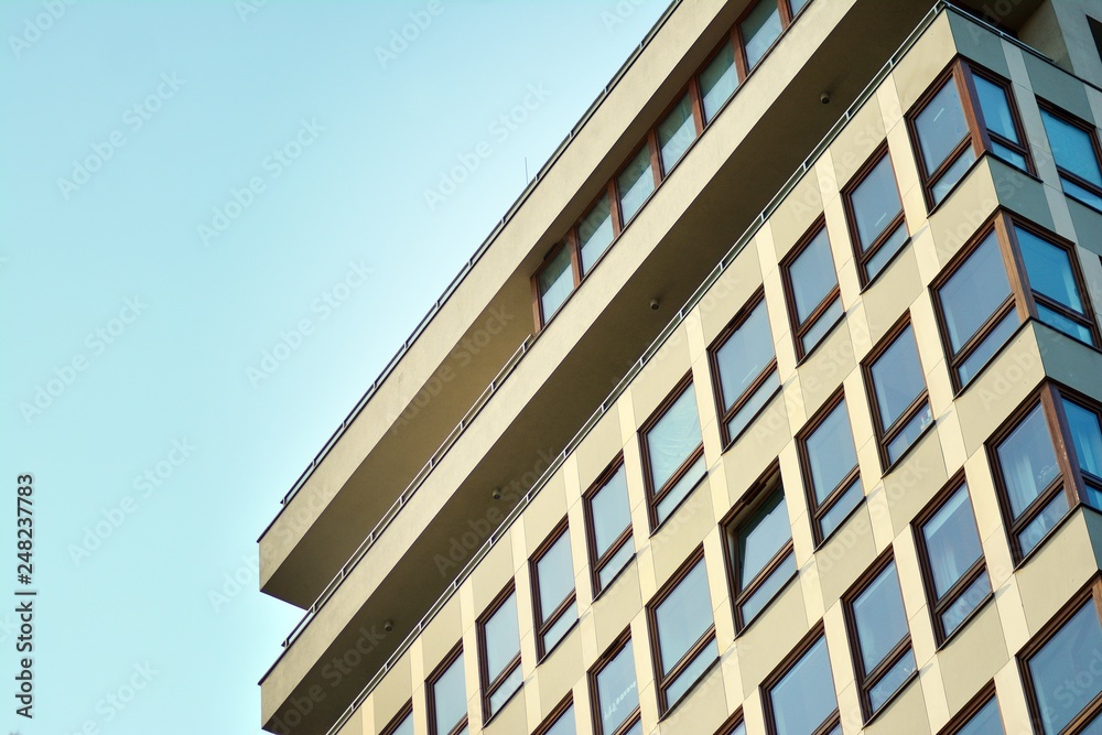 custom made wallpaper toronto digitalModern apartment buildings on a sunny day with a blue sky. Facade of a modern apartment building