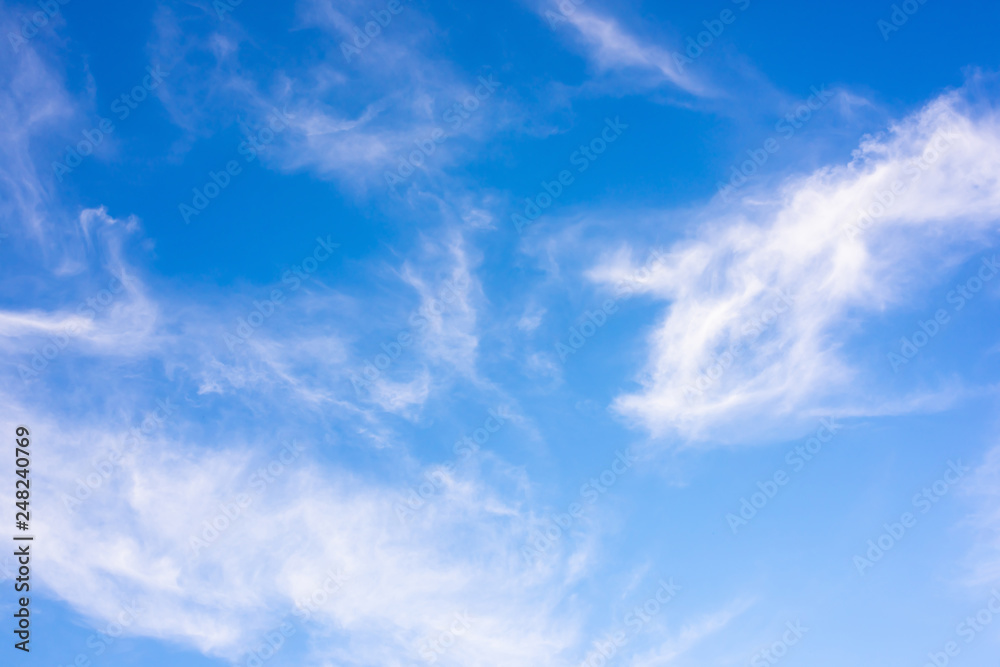 Clouds on a blue sky as background