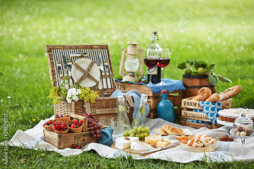Photos Wicker picnic hamper with assorted fresh food