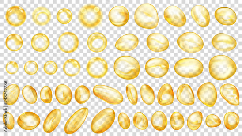 Set of yellow translucent water drops and bubbles of different shapes, isolated on transparent background. Transparency only in vector format